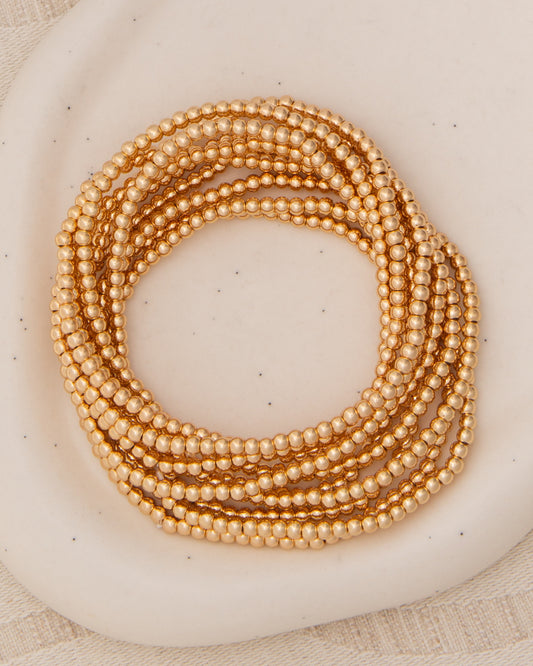 Clare Metallic Crimp Bead Stretch Bracelet Stack | Gold