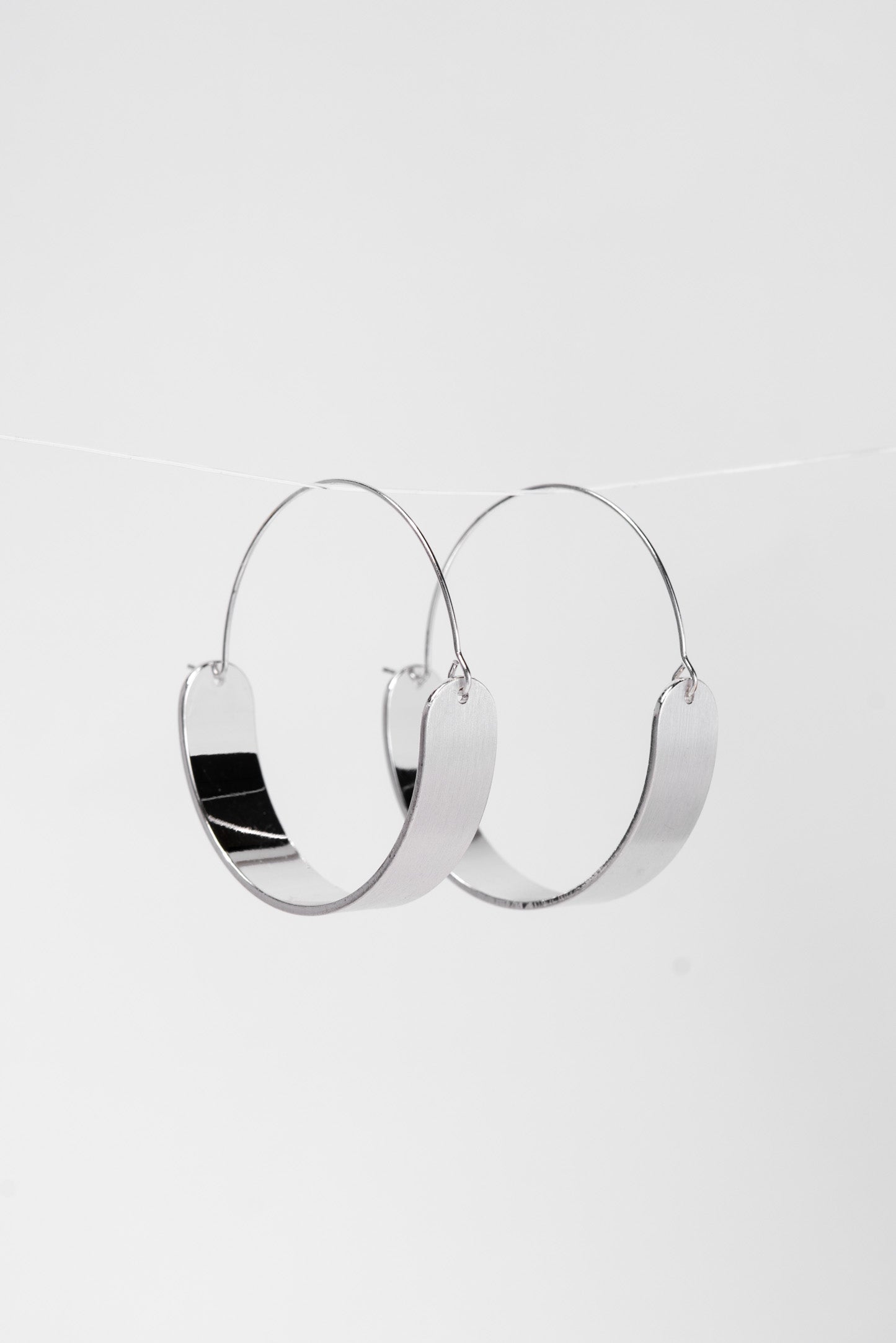 Faye Brushed Metal Swing Hoop Earrings