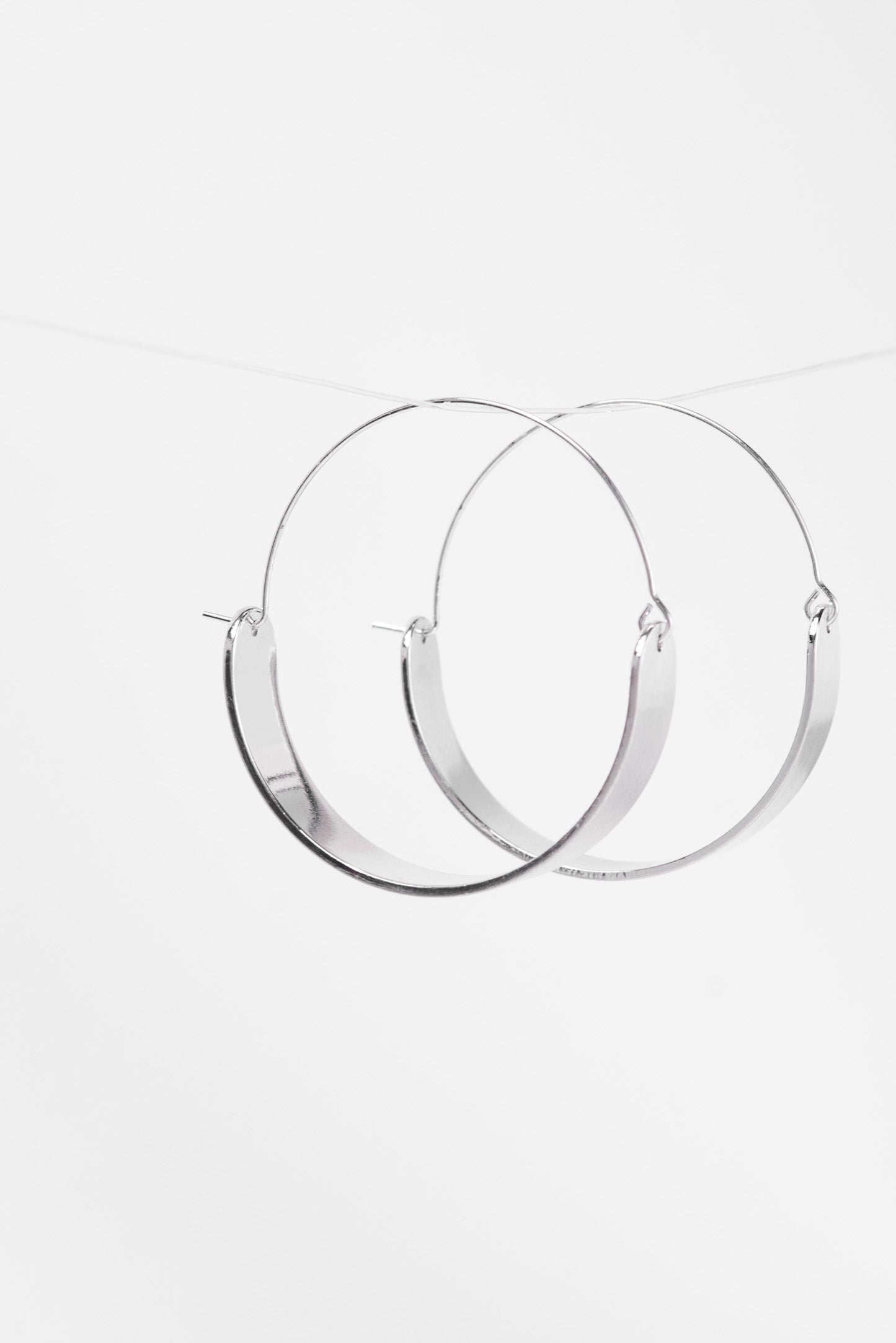 Faye Brushed Metal Swing Hoop Earrings