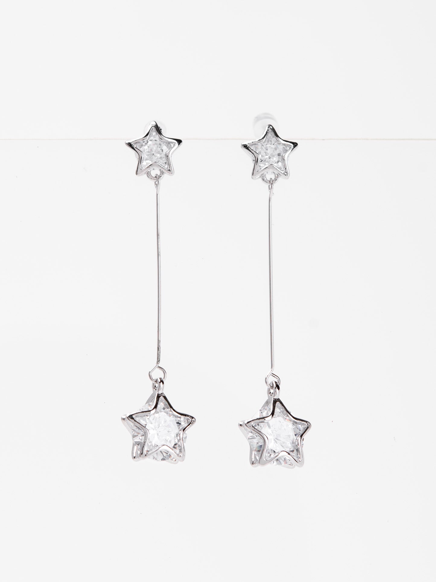 Clementine White Gold Plated Star CZ Drop Earrings