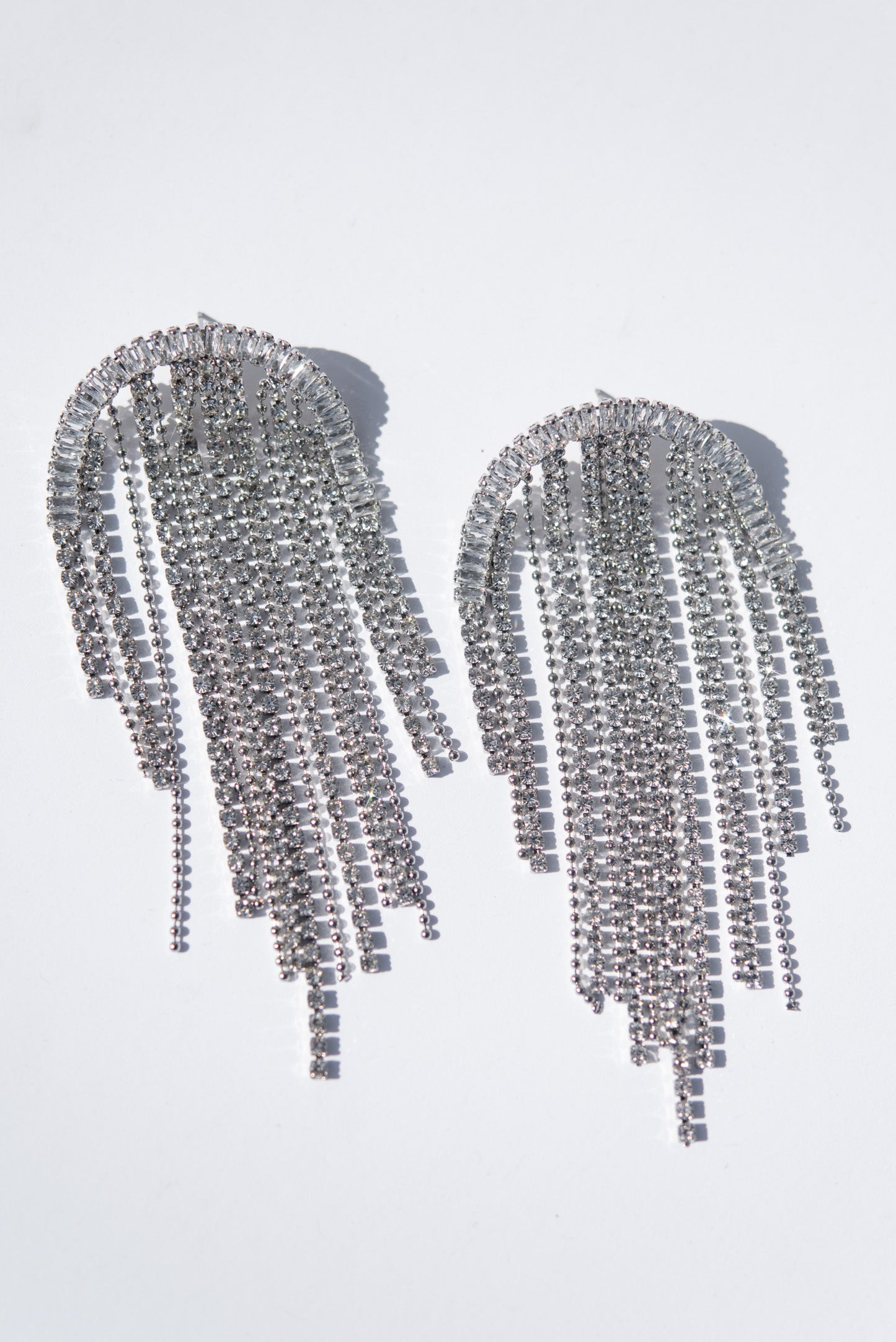 Delilah Crystal Arched Tassel Drop Earrings