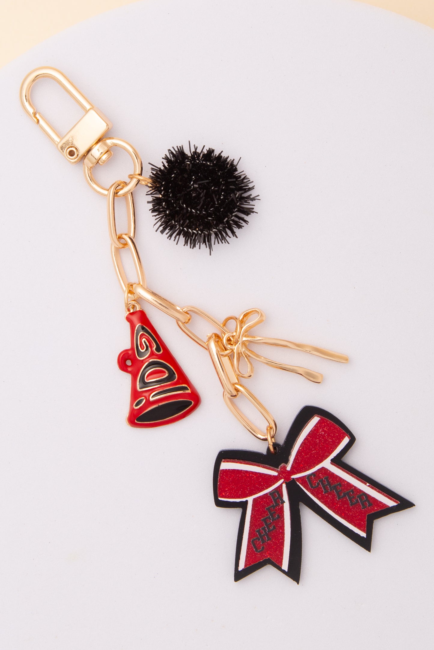Aurora Bag Charm Keychain with Pom Pom and Bow