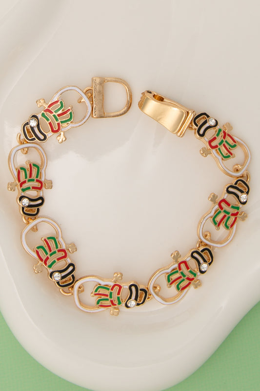 Paisley Christmas Enamel Charm Bracelet with Snowman Design | Gold