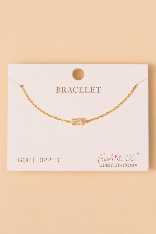 Julia Bezel-Set Baguette Cut Cubic Zirconia Solitaire Bracelet | Gold