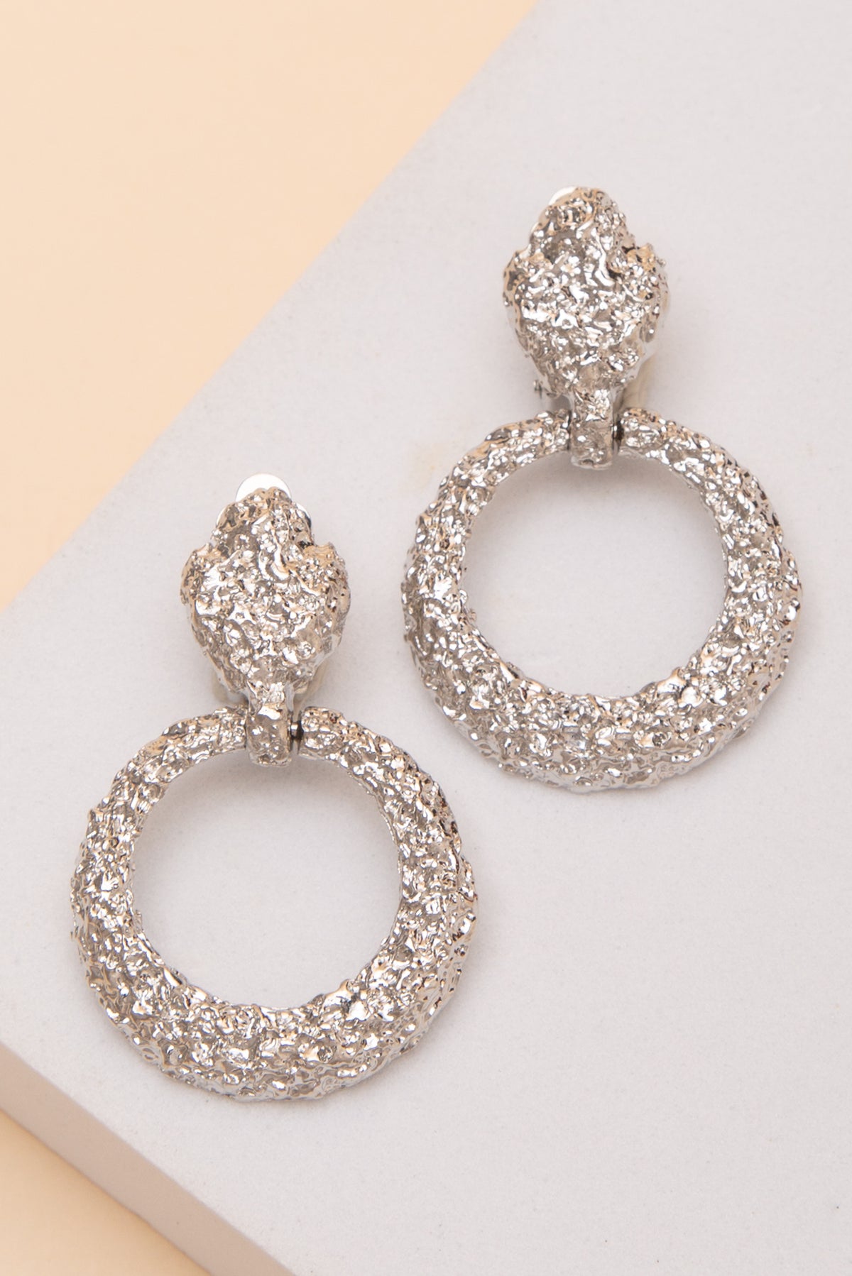 Eliana Textured Open Circle Clip On Earrings