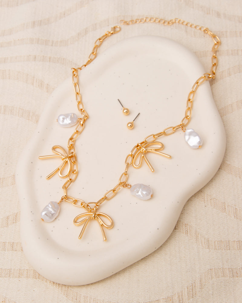Nadia Bow and Baroque Pearl Pendant Necklace Earring Set