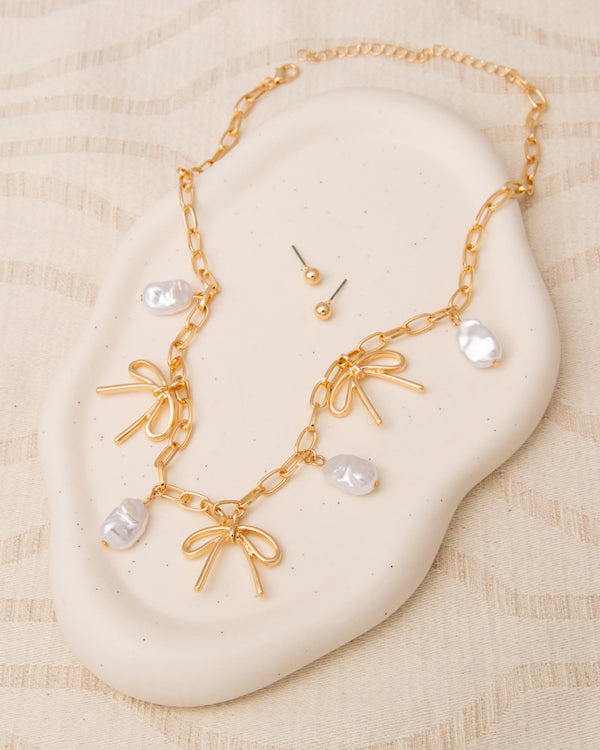Nadia Bow and Baroque Pearl Pendant Necklace Earring Set