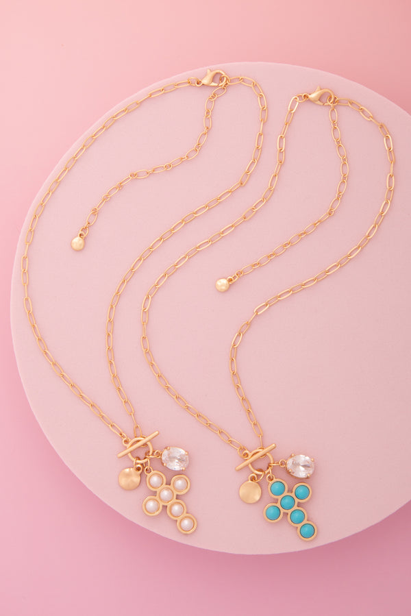 Mallory Pearl / Turquoise Embellished Cross Pendant Toggle Necklace
