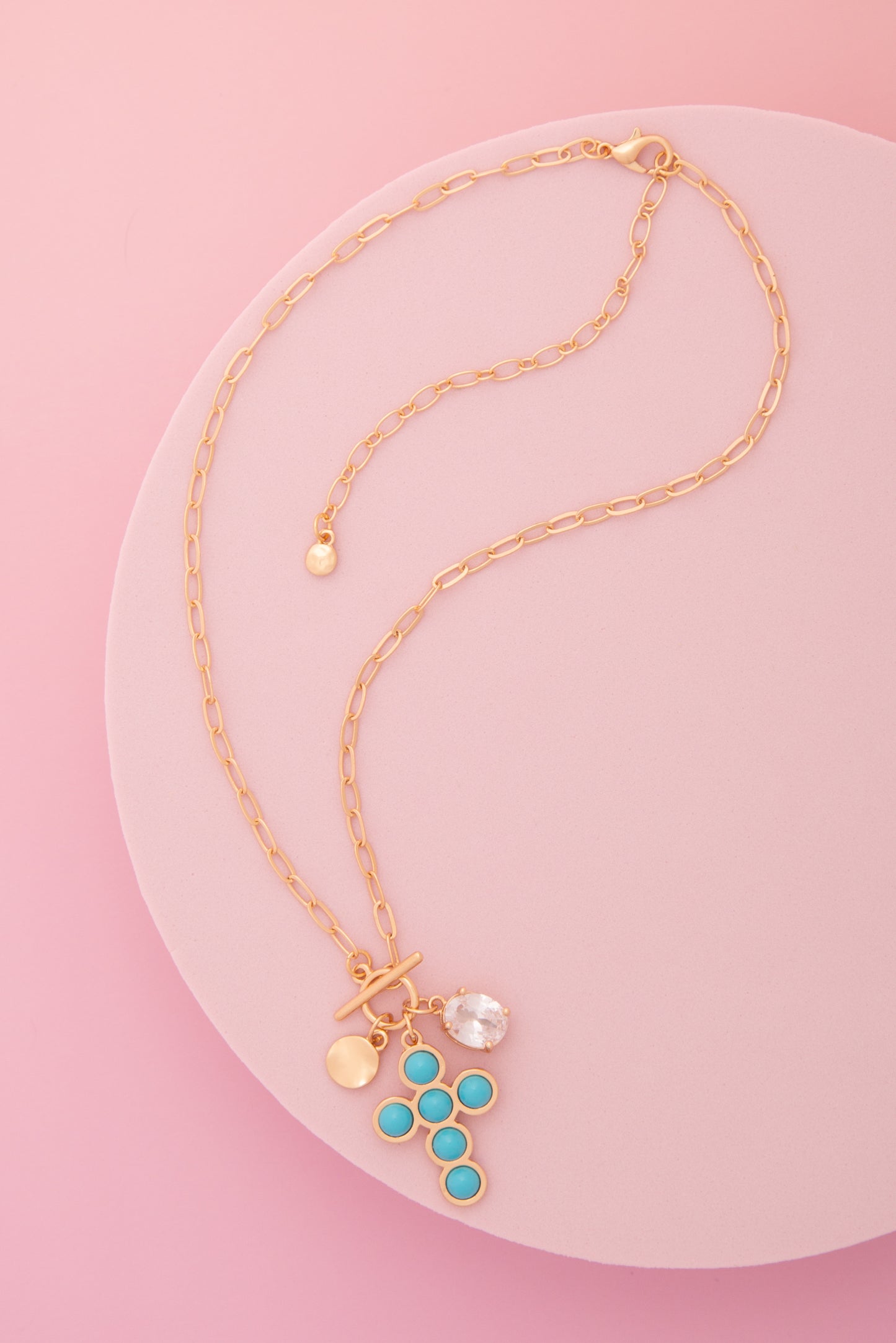 Mallory Pearl / Turquoise Embellished Cross Pendant Toggle Necklace
