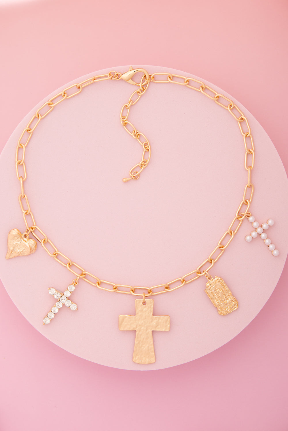 Monica  Charm Necklace Featuring Pearl, Crystal, and Cross Trinkets