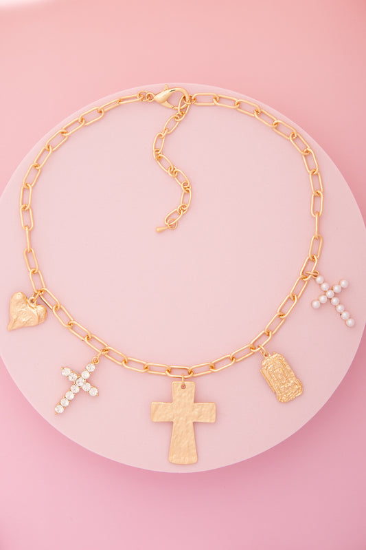 Monica  Charm Necklace Featuring Pearl, Crystal, and Cross Trinkets