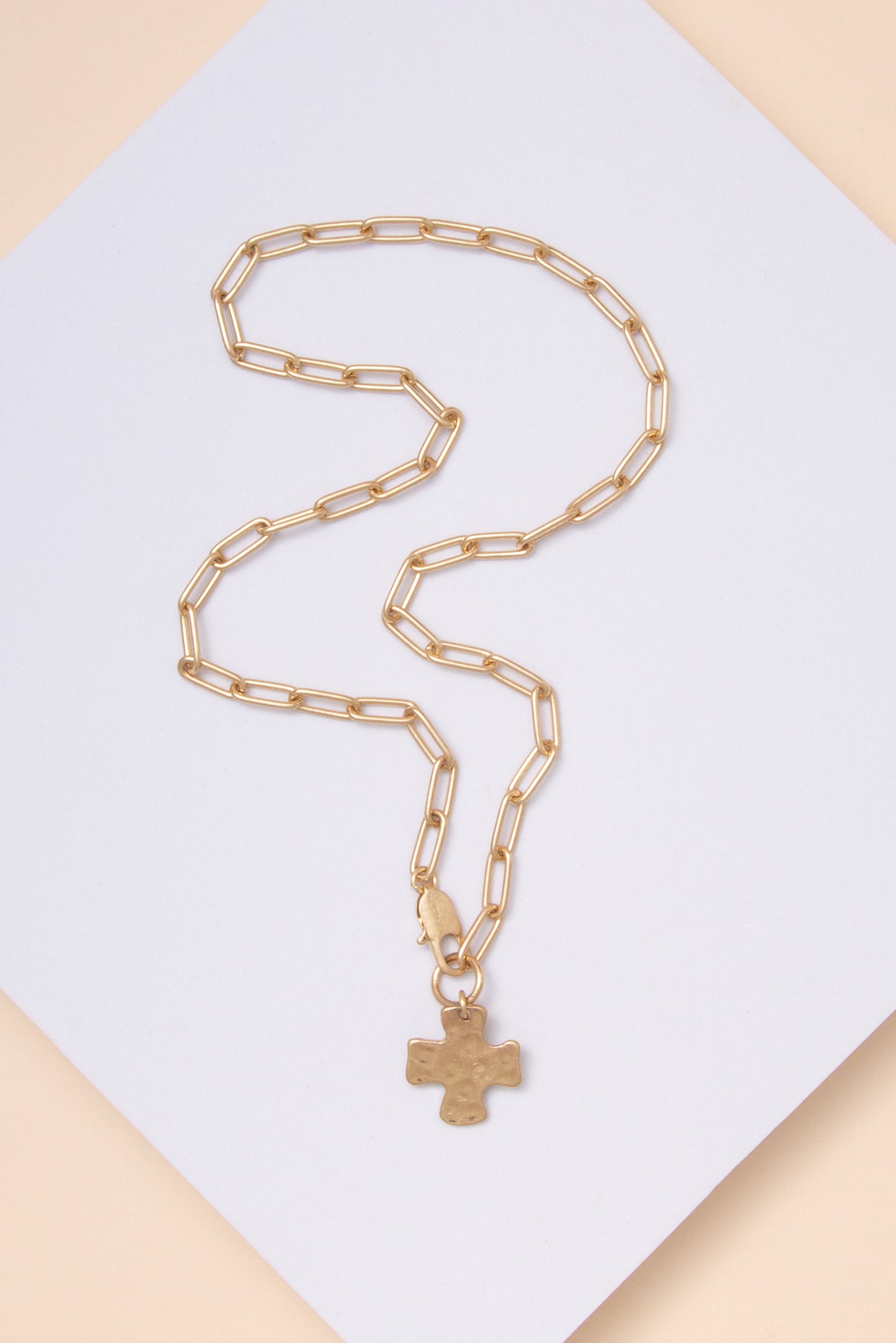Estella Hammered Cross Pendant Necklace in Gold Tone Metal