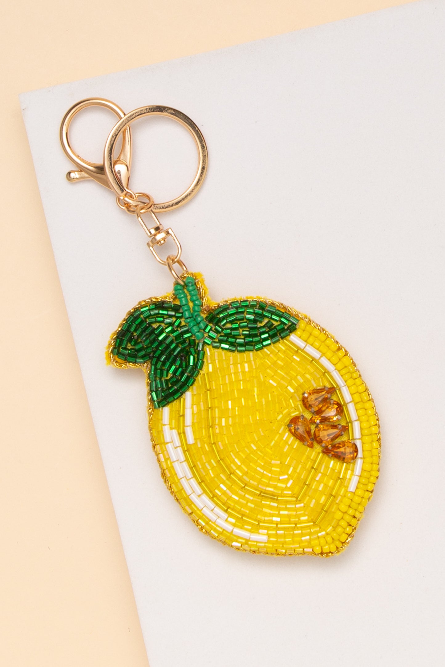 Mallory Lemon Seed Beaded Bag Charm Keychain
