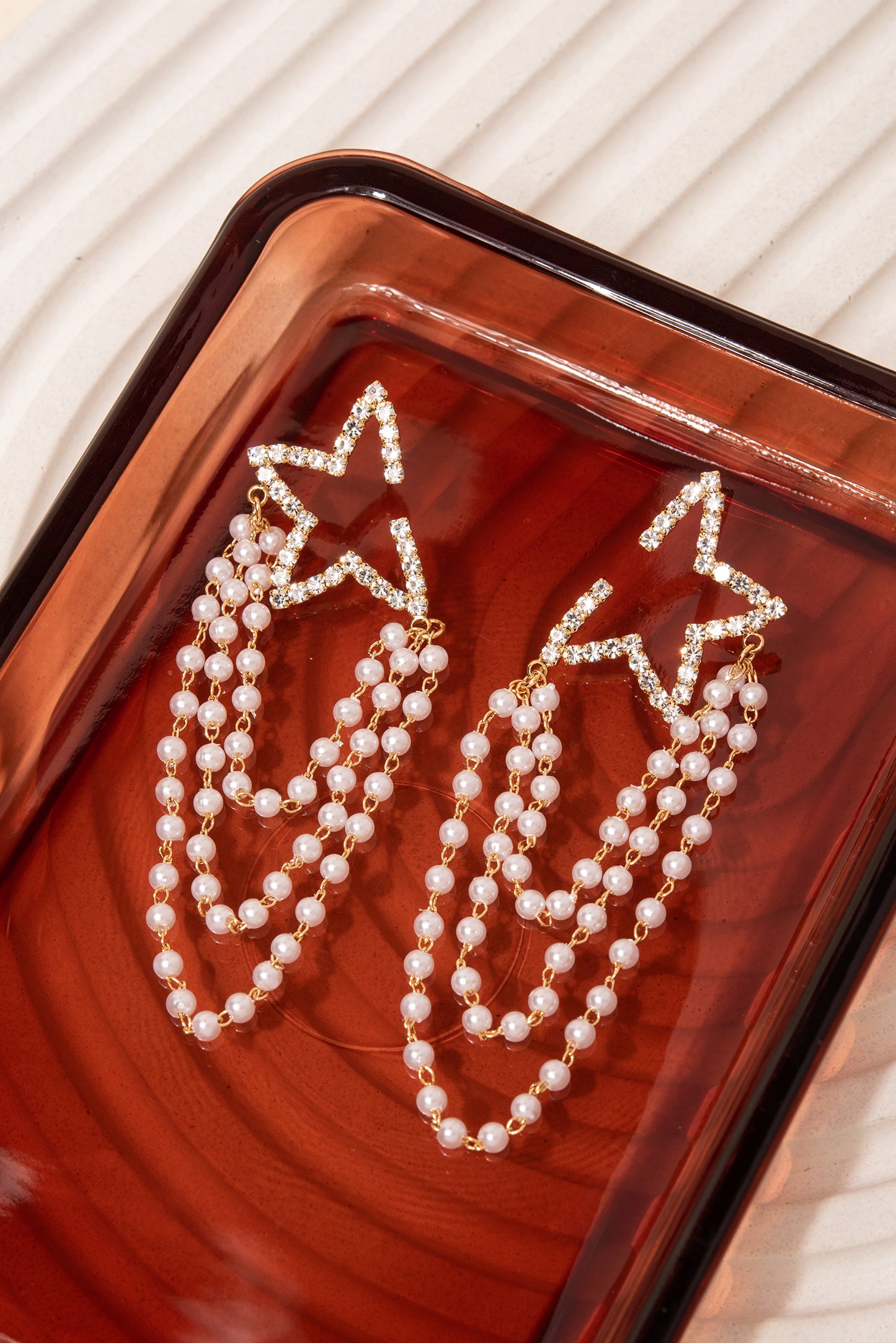 Astra Pearl Draped Star Earrings